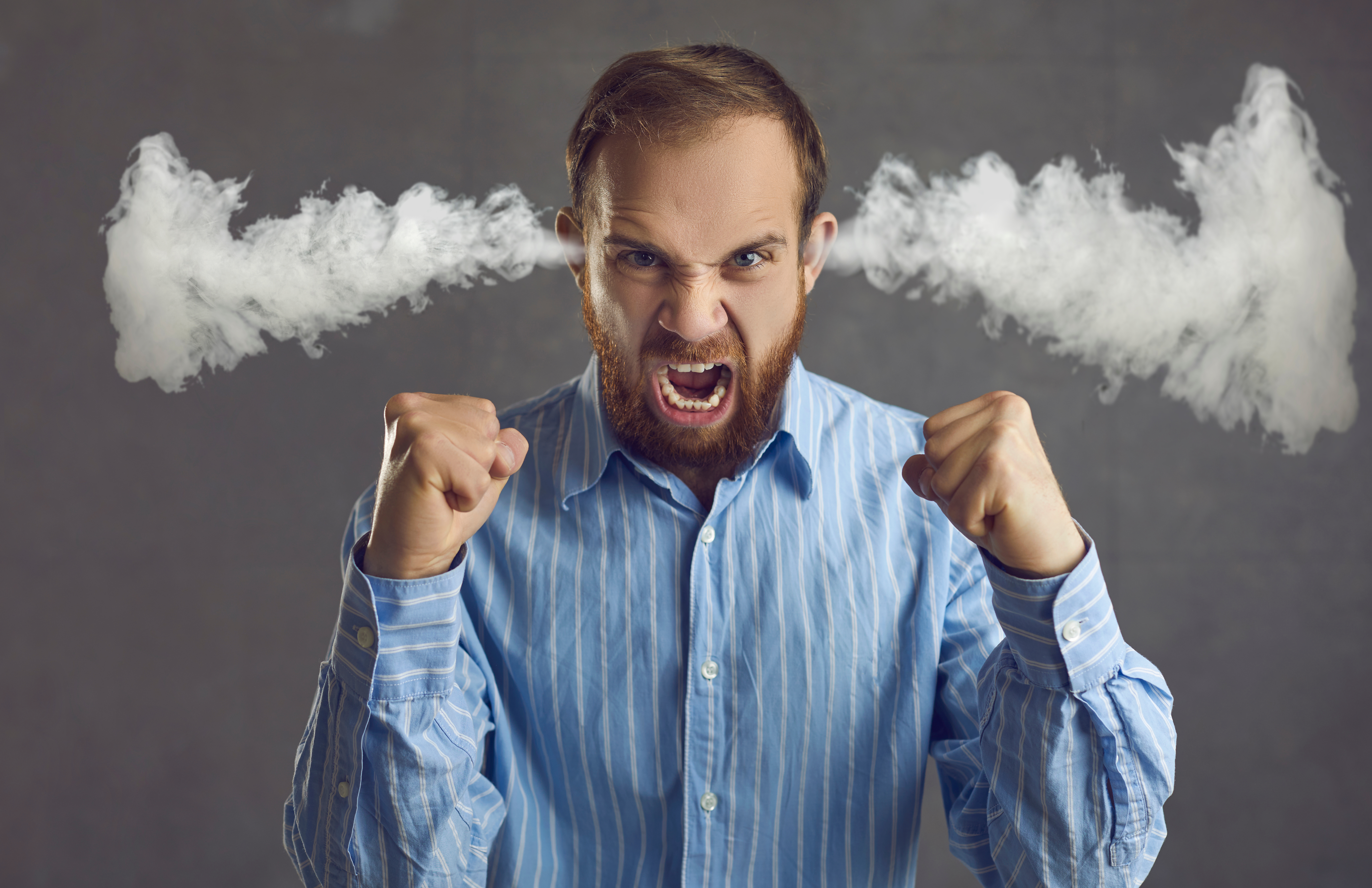 picutre of a man with steam coming out of his ears