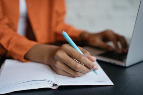 image of typing and writing
